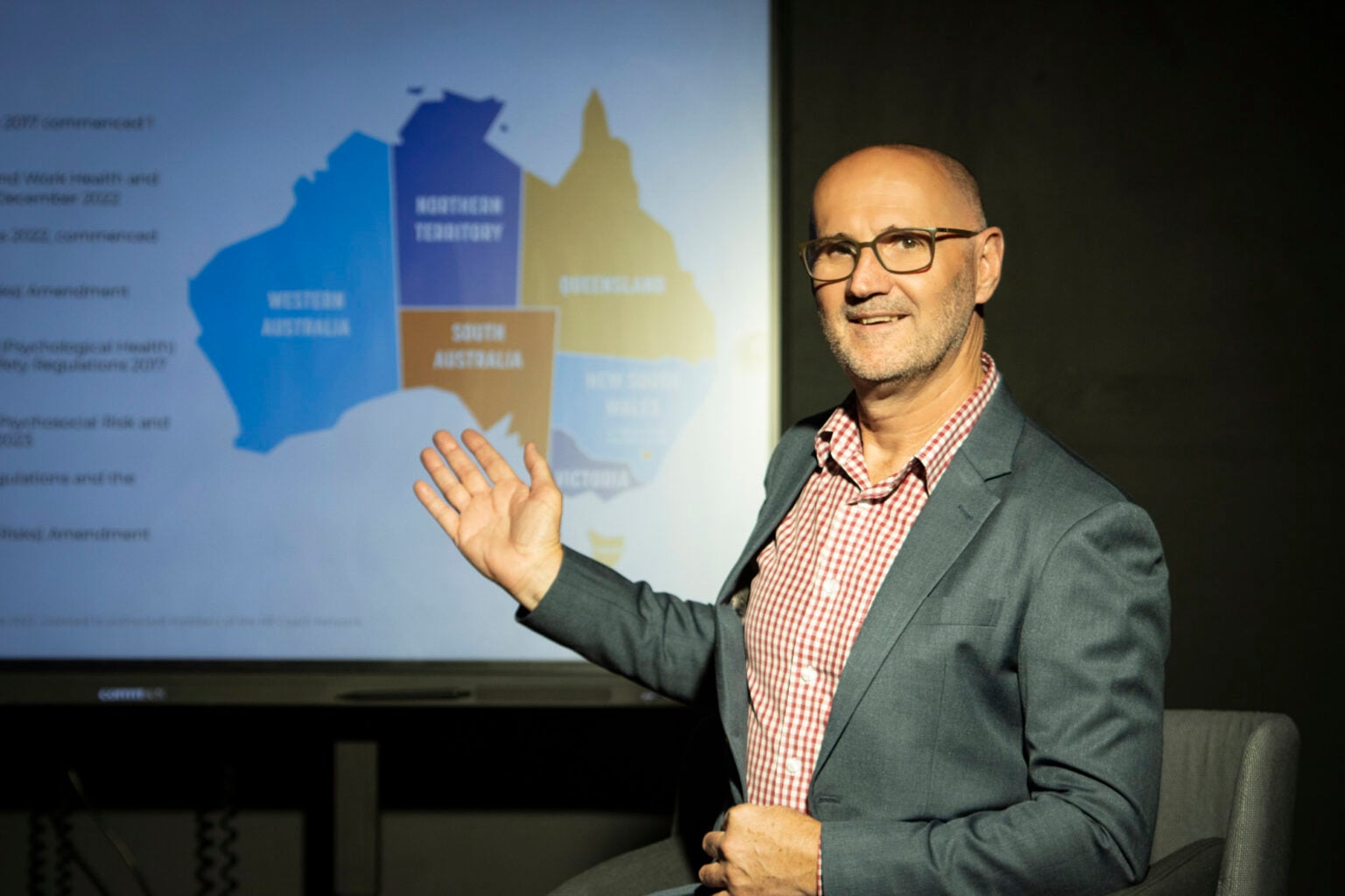 Rod Smith presenting People Management Partners HR compliance overview using a state-by-state map.