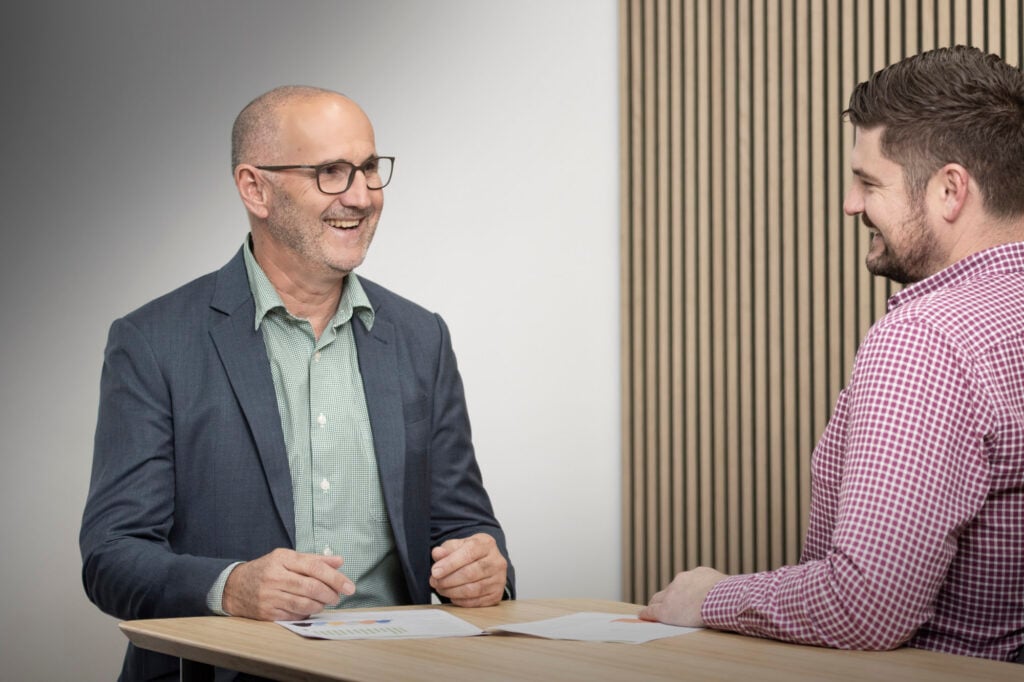 Rod Smith of People Management Partners in conversation during an HR strategy meeting.